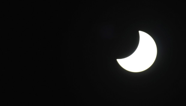 GARMISCH-PARTENKIRCHEN, GERMANY - MARCH 20: The final phase of a partial solar eclipse  is seen on March 20, 2015 in Garmisch-Partenkirchen, Germany. Over Central Europe the moon was scheduled to cover approximately 75% of the sun for a short period starting at approximately 9:30am. The next solar eclipse will not occur until 2021. (Photo by Philipp Guelland/Getty Images)